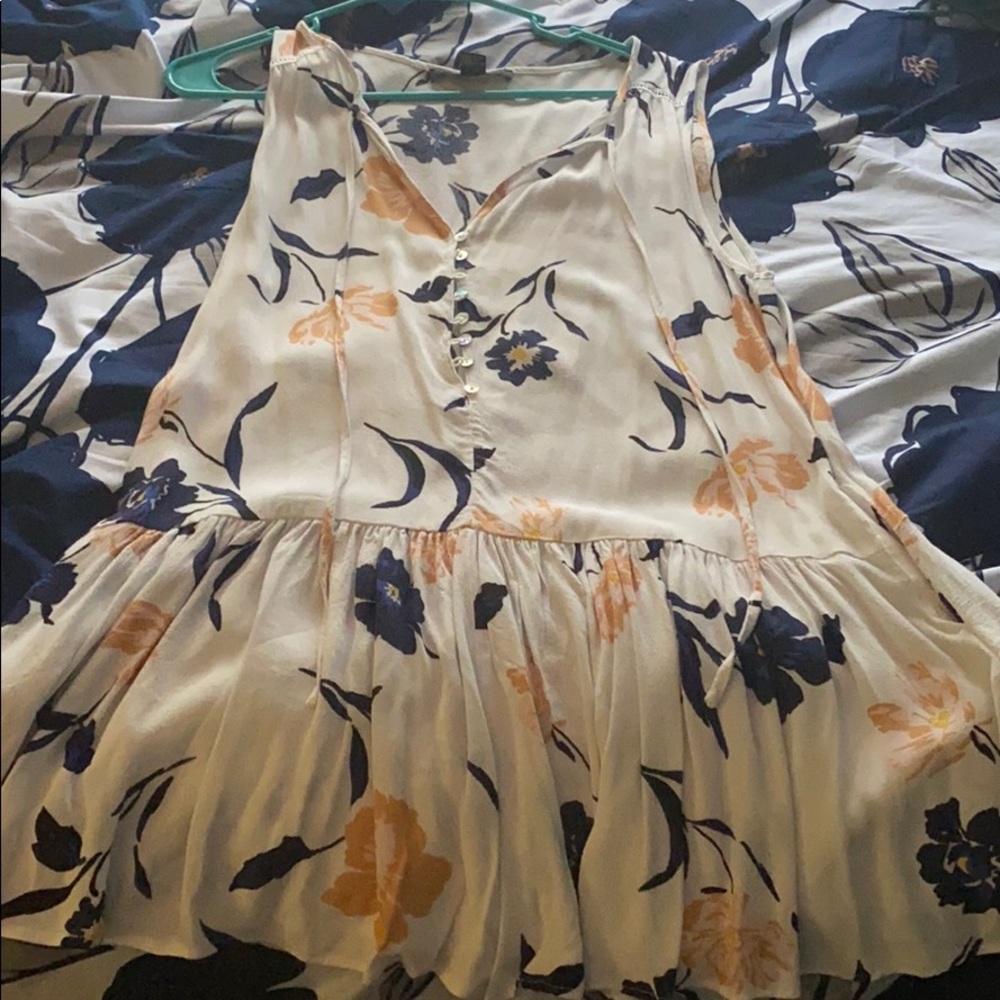 Creme with floral designs romper